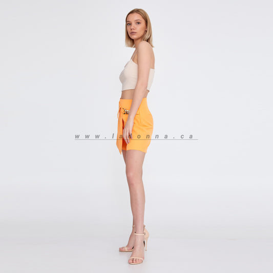 ORANGE MINI SKIRT FEATURED WITH A CHAIN ON THE SIDE